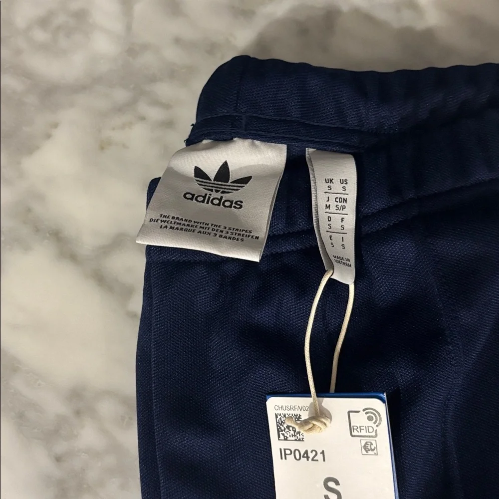 Adidas men’s Blue Joggers with White Stripes